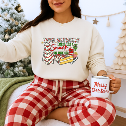 Unisex Heavy Blend™ mw2027 | Torn Between Looking Like a Snack Christmas Sweatshirt – Funny Holiday Crewneck | Cute Unisex Winter Gift